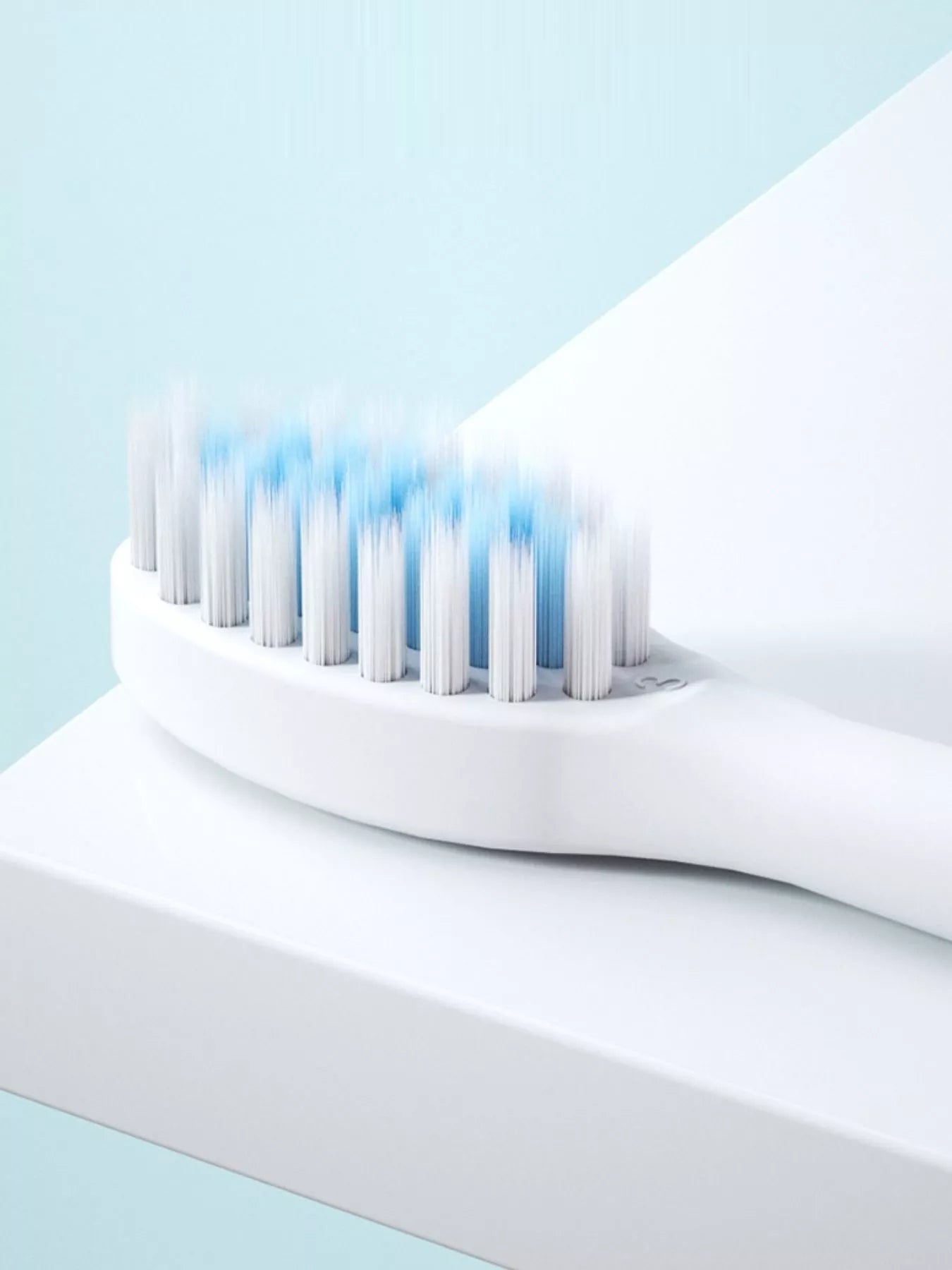 White electric toothbrush with multiple cleaning modes, branded Trendsi, featuring a sleek design and ergonomic handle.