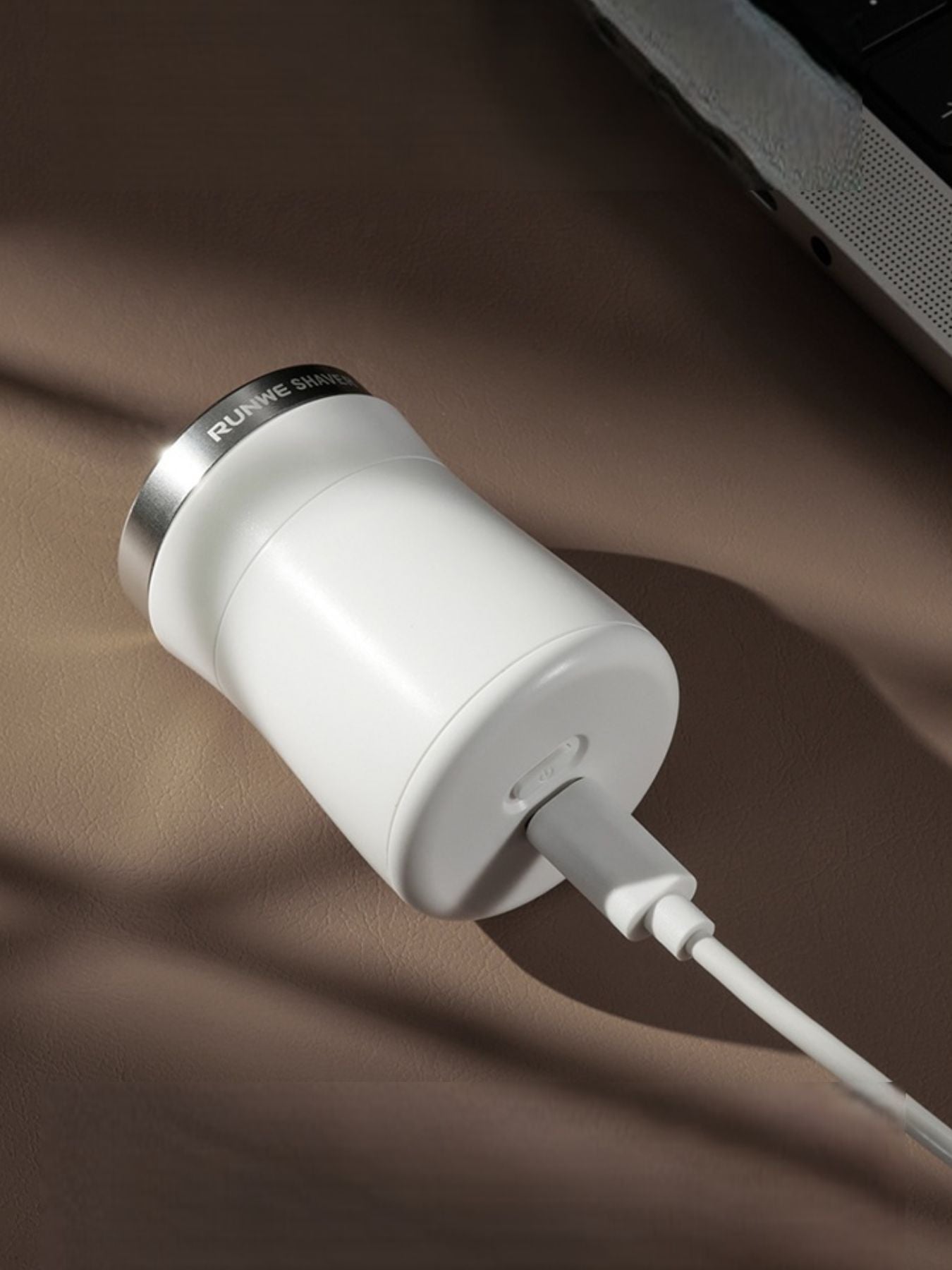 White Trendsi painless electric hair remover with compact design for easy hair removal at home.