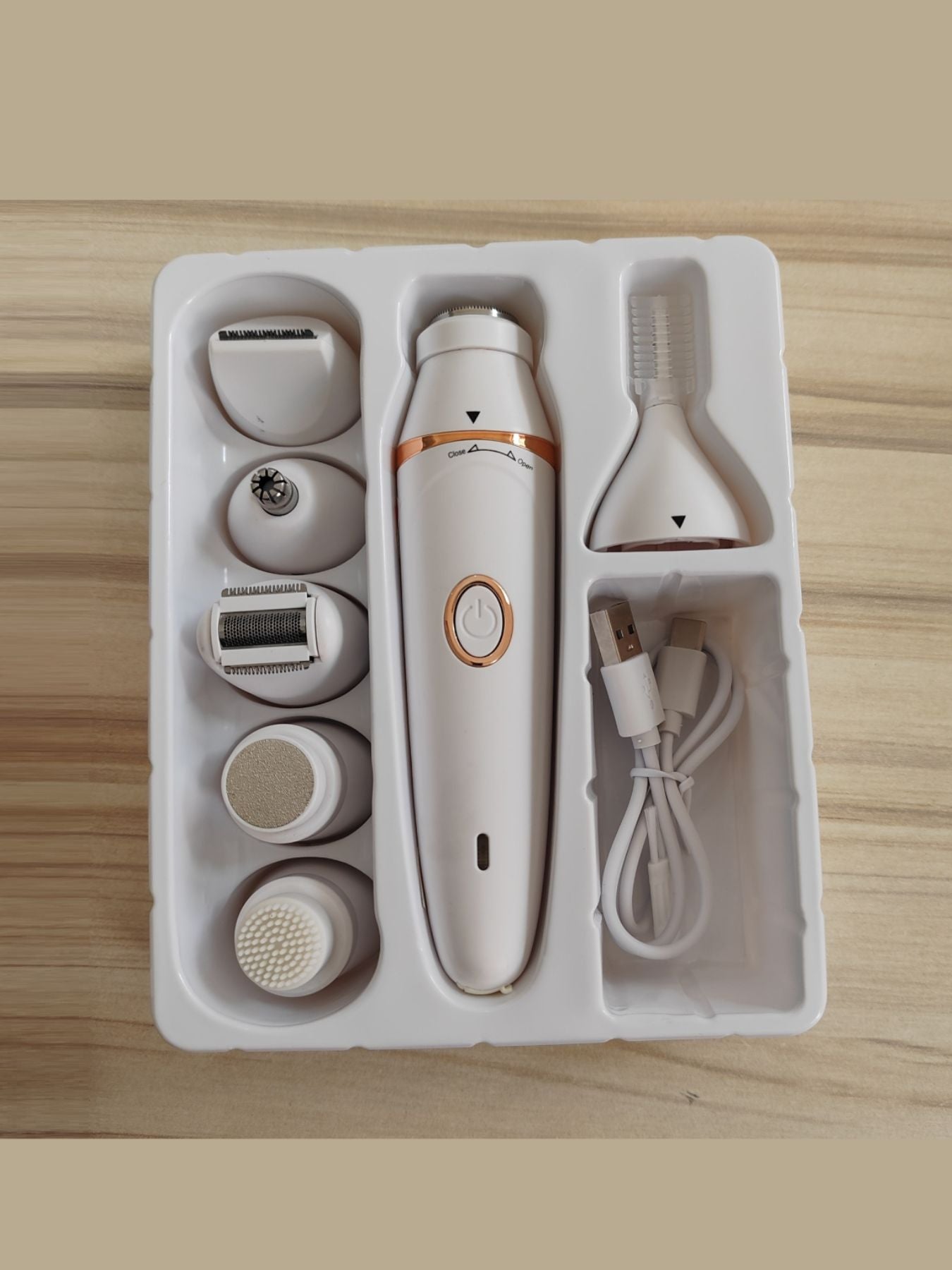 White Trendsi painless multifunctional hair removal epilator with multiple attachments for efficient, gentle hair removal.