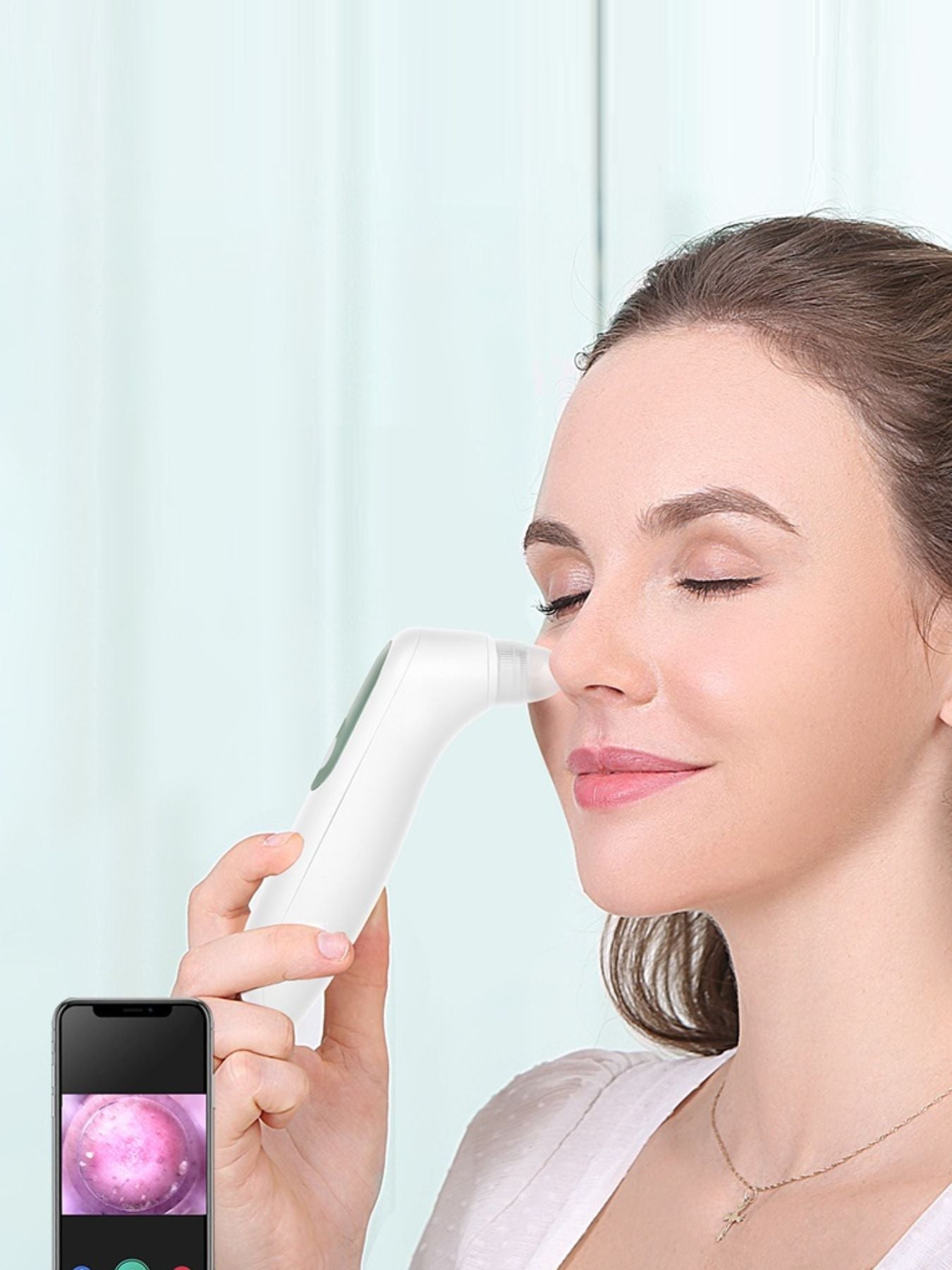 White painless pore vacuum blackhead extractor from Trendsi showing the device with a sleek design and multiple suction heads.
