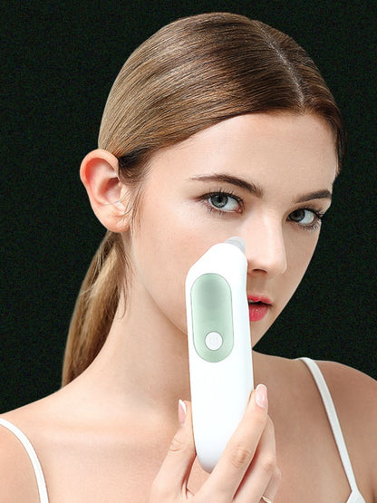 White painless pore vacuum blackhead extractor from Trendsi with a compact design, used for deep cleansing of pores.