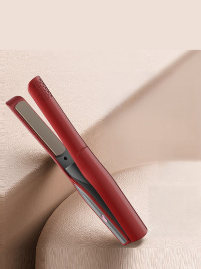White portable ceramic hair straightener by Trendsi with compact design and ceramic plates for smooth, sleek hair styling.