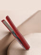 White portable ceramic hair straightener by Trendsi with compact design and ceramic plates for smooth, sleek hair styling.