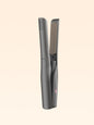White portable ceramic hair straightener by Trendsi with sleek design and compact size for easy styling on the go.