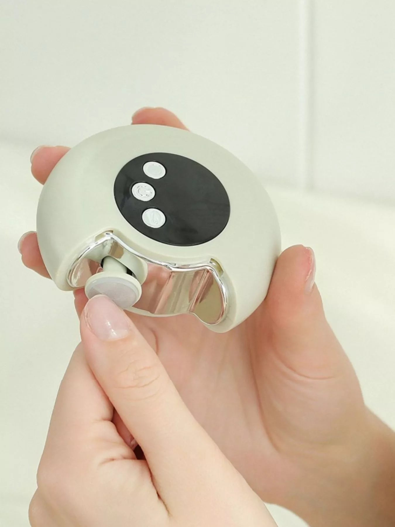White portable electric nail buffer polisher by Trendsi, compact design for smooth and shiny nails.