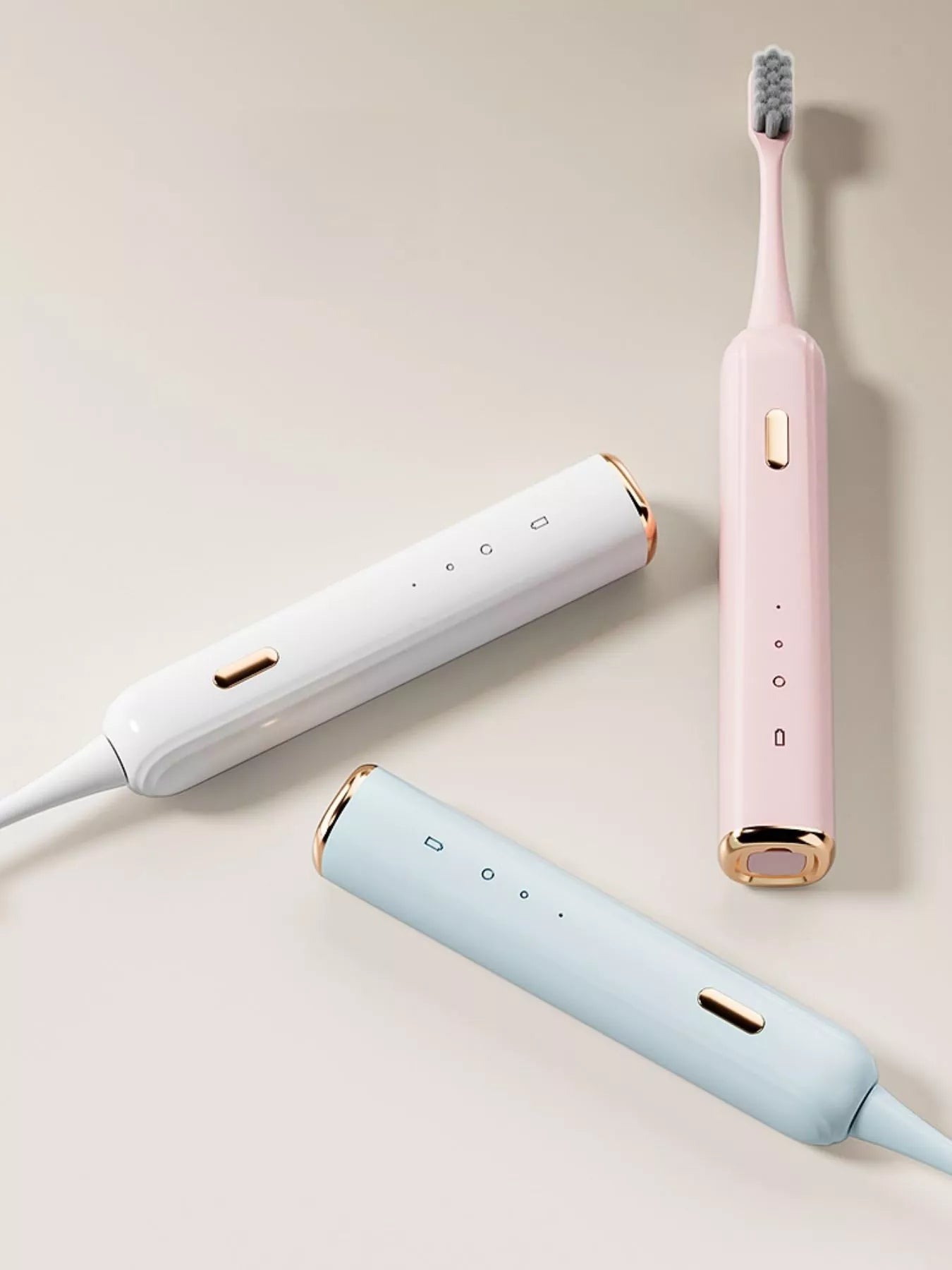 White portable electric toothbrush from Trendsi with compact design and charging base, ideal for travel and daily oral hygiene.