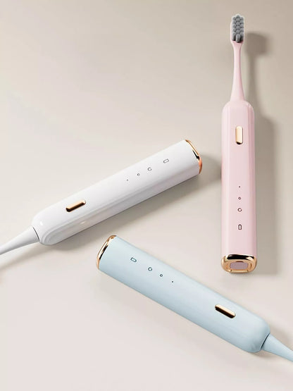 White portable electric toothbrush from Trendsi with compact design and charging base, ideal for travel and daily oral hygiene.