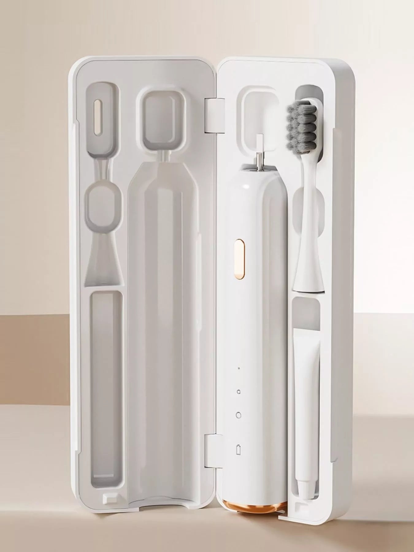 White portable electric toothbrush by Trendsi with a compact design and rechargeable battery, ideal for travel and everyday use.