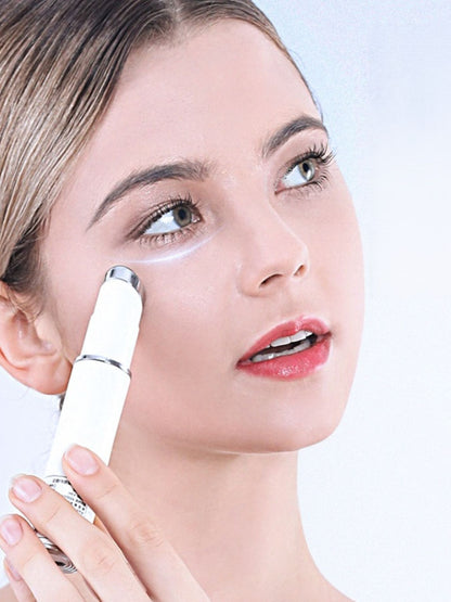 White portable facial beauty device from Trendsi, compact and sleek for skincare on the go.