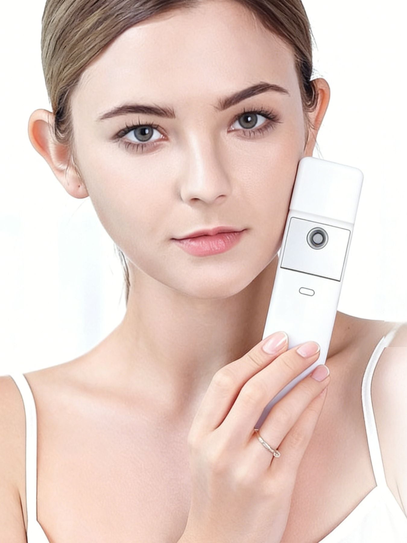 White portable facial mister beauty device by Trendsi, compact handheld skincare tool with spray nozzle for moisturizing skin.