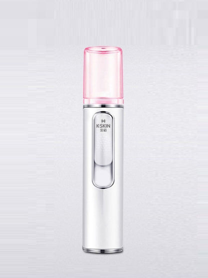 White portable facial mist nano sprayer by Trendsi, compact design for refreshing skin hydration on the go.