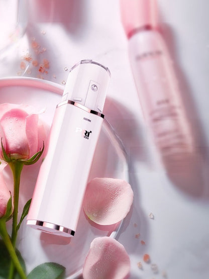 White portable facial steamer beauty device by Trendsi, compact design with steam nozzle for facial hydration and skincare.
