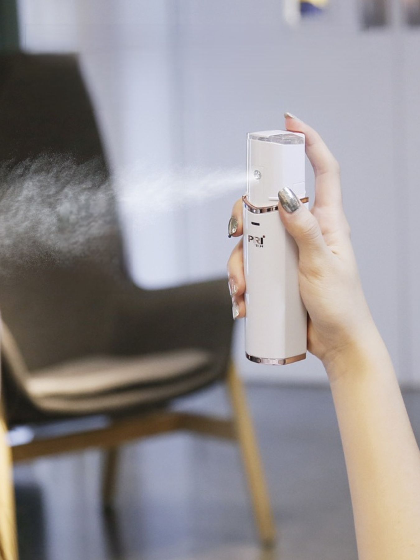 White portable facial steamer beauty device by Trendsi for skincare, featuring a sleek design and easy-to-use facial steaming functionality.