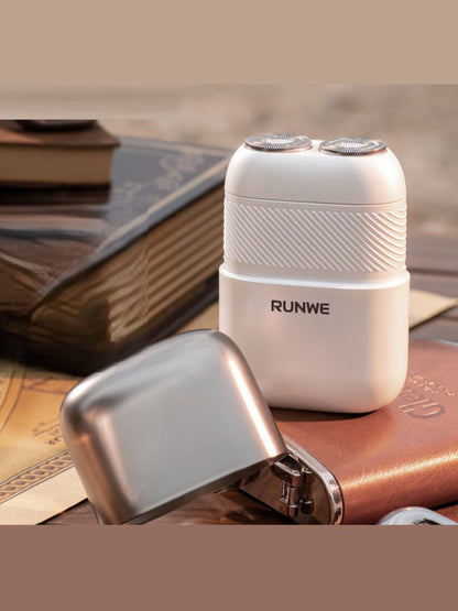 White portable mini electric shaver by Trendsi with compact design, ideal for quick and convenient grooming.