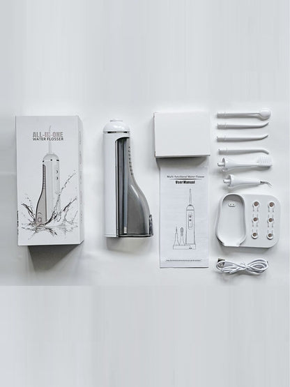 White portable water flosser with multiple nozzles from Trendsi, compact oral hygiene device for effective flossing.