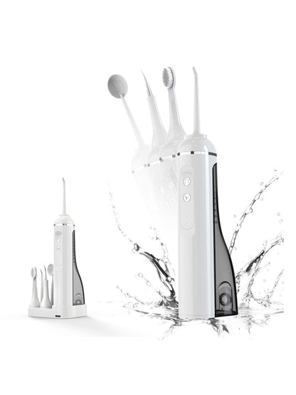 White portable water flosser with multiple nozzles, compact design, ideal for oral hygiene and travel use.