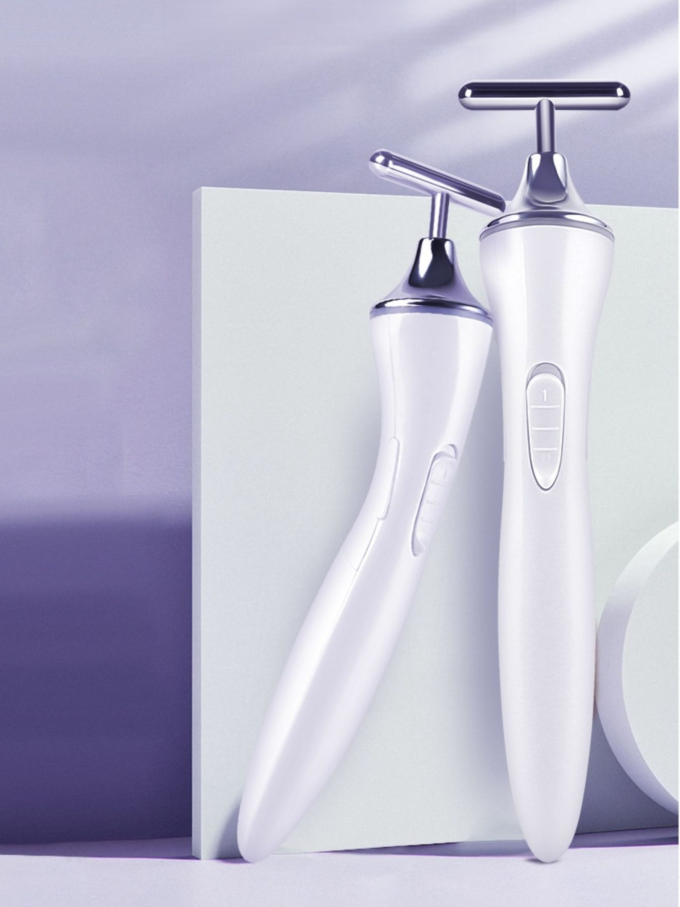 White T-shape Trendsi microcurrent facial massager device for skin toning and anti-aging skincare.