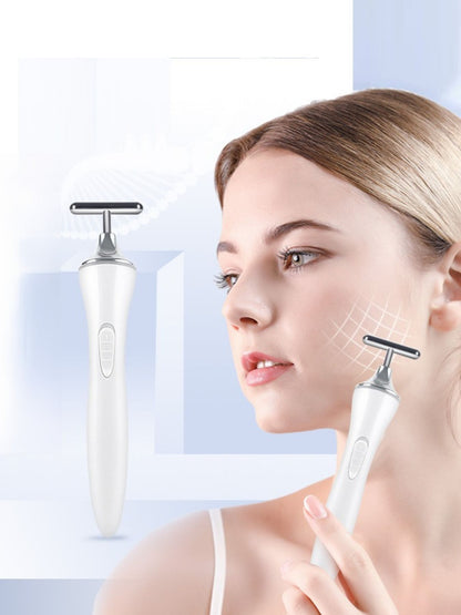 White T-shape Trendsi microcurrent facial massager beauty device for facial toning and skin rejuvenation.