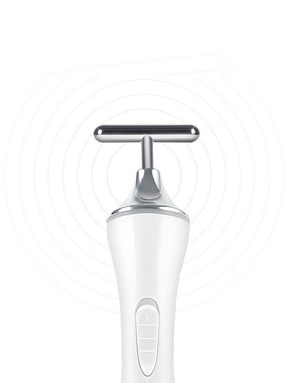 White T-shape Trendsi microcurrent facial massager beauty device for skin toning and rejuvenation.