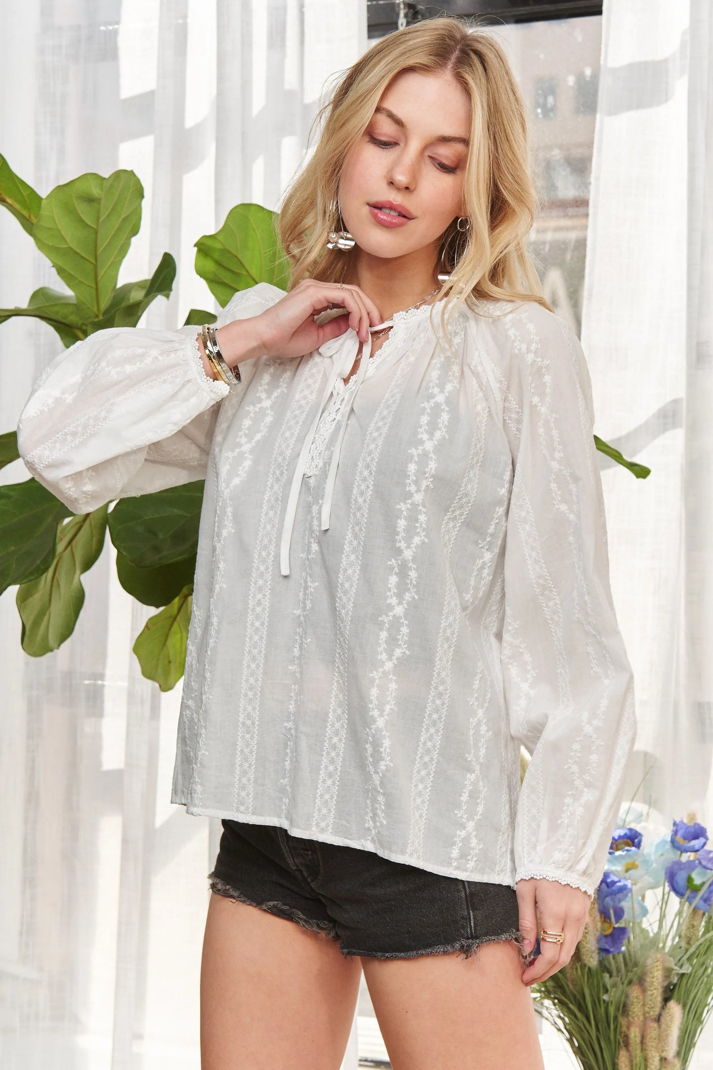 White ADORA Cotton Peasant Top by Trendsi, featuring a relaxed fit with puff sleeves and a square neckline, casual boho style.