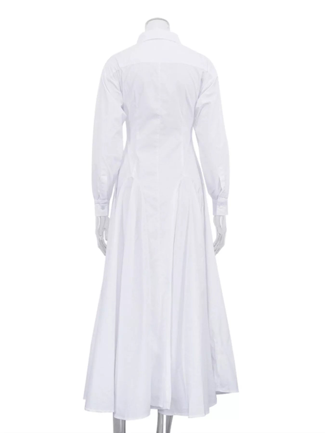 White button-front long sleeve maxi shirt dress by Trendsi, featuring a relaxed fit and classic collar for casual or dressy occasions.