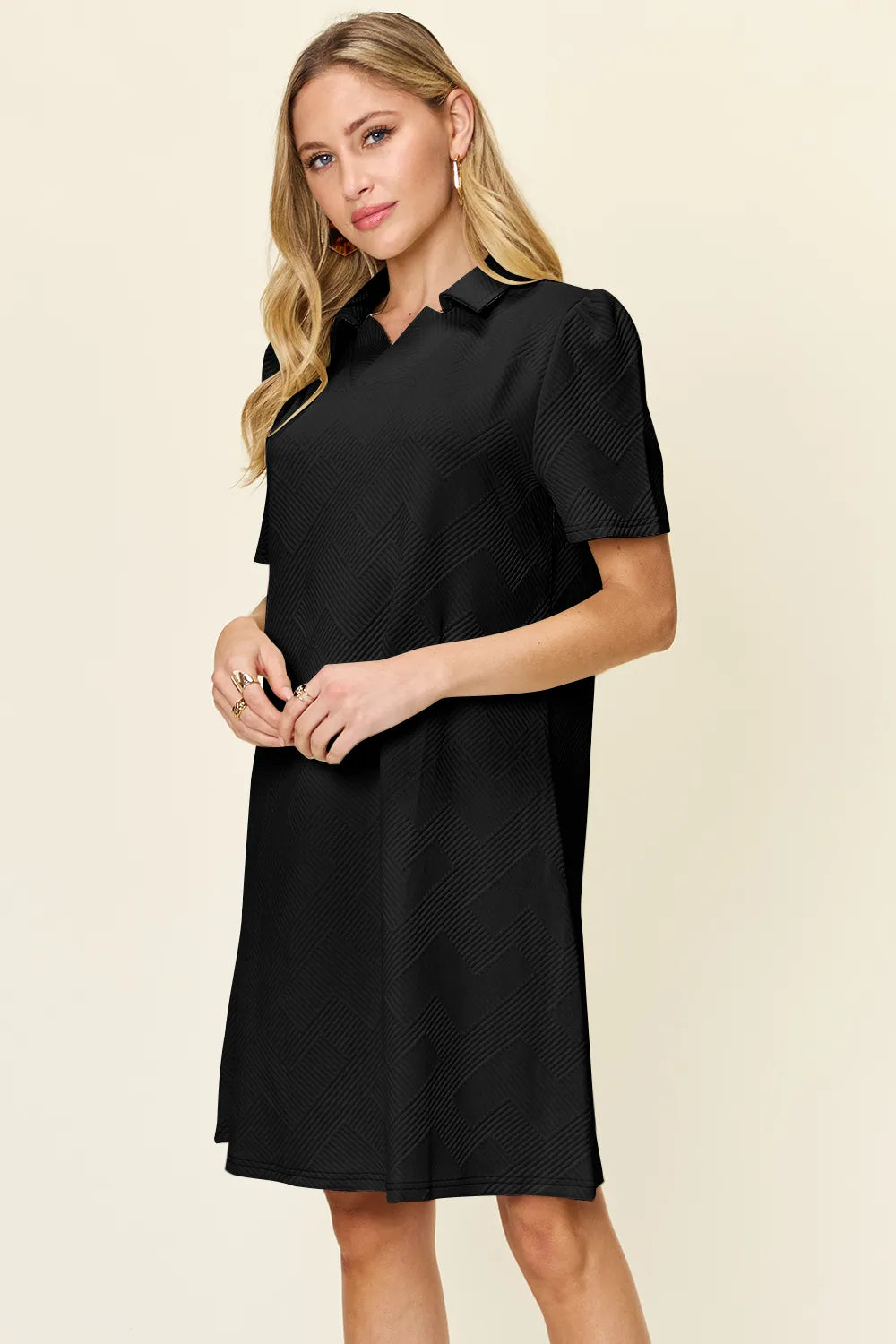White Trendsi Double Take full-size textured collared neck short sleeve dress displayed on a hanger.