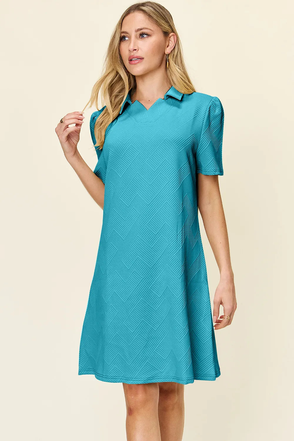 White Trendsi Double Take full-size textured short sleeve dress with a collared neck, displayed on a mannequin.