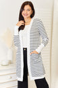 White double take striped open front longline cardigan by Trendsi, featuring a relaxed fit and cozy knit fabric.