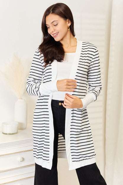 White double take striped open front longline cardigan from Trendsi, featuring a relaxed fit and cozy knit fabric.