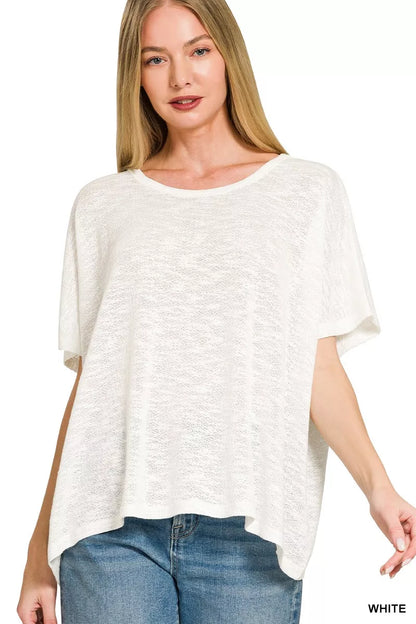 White Zenana oversized slub hacci top with a relaxed fit and textured fabric, styled on a model showcasing its casual, comfortable look.