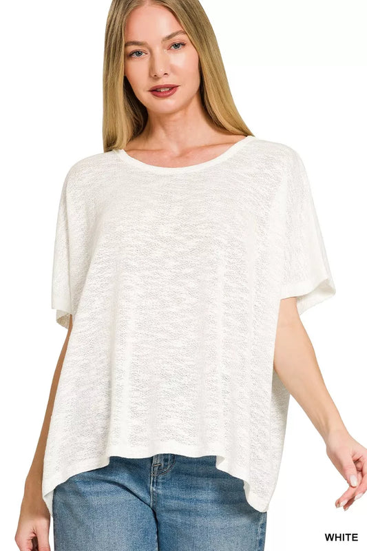 White Zenana oversized slub hacci top with a relaxed fit and textured fabric, styled on a model showcasing its casual, comfortable look.