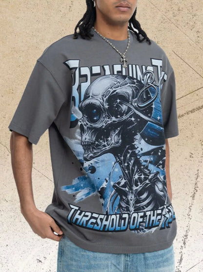 Men's white skull graphic round neck T-shirt by Trendsi, featuring a bold skull design on soft cotton fabric.