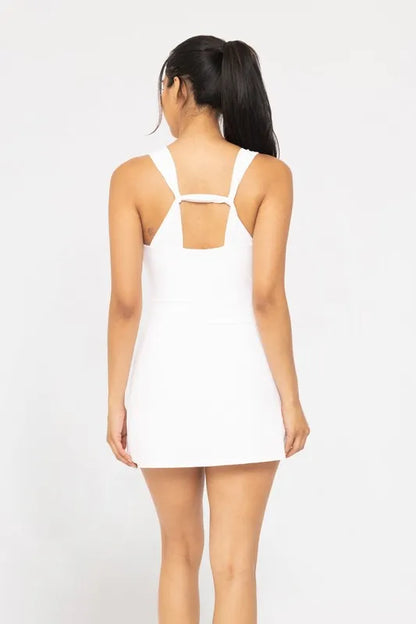 White MONO B adjustable active A-line dress by Trendsi, featuring a flattering fit and stylish design, displayed on a model.
