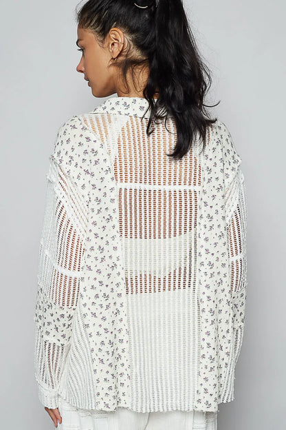 White floral crochet patchwork long sleeve shirt by Trendsi featuring intricate floral embroidery and a relaxed fit.