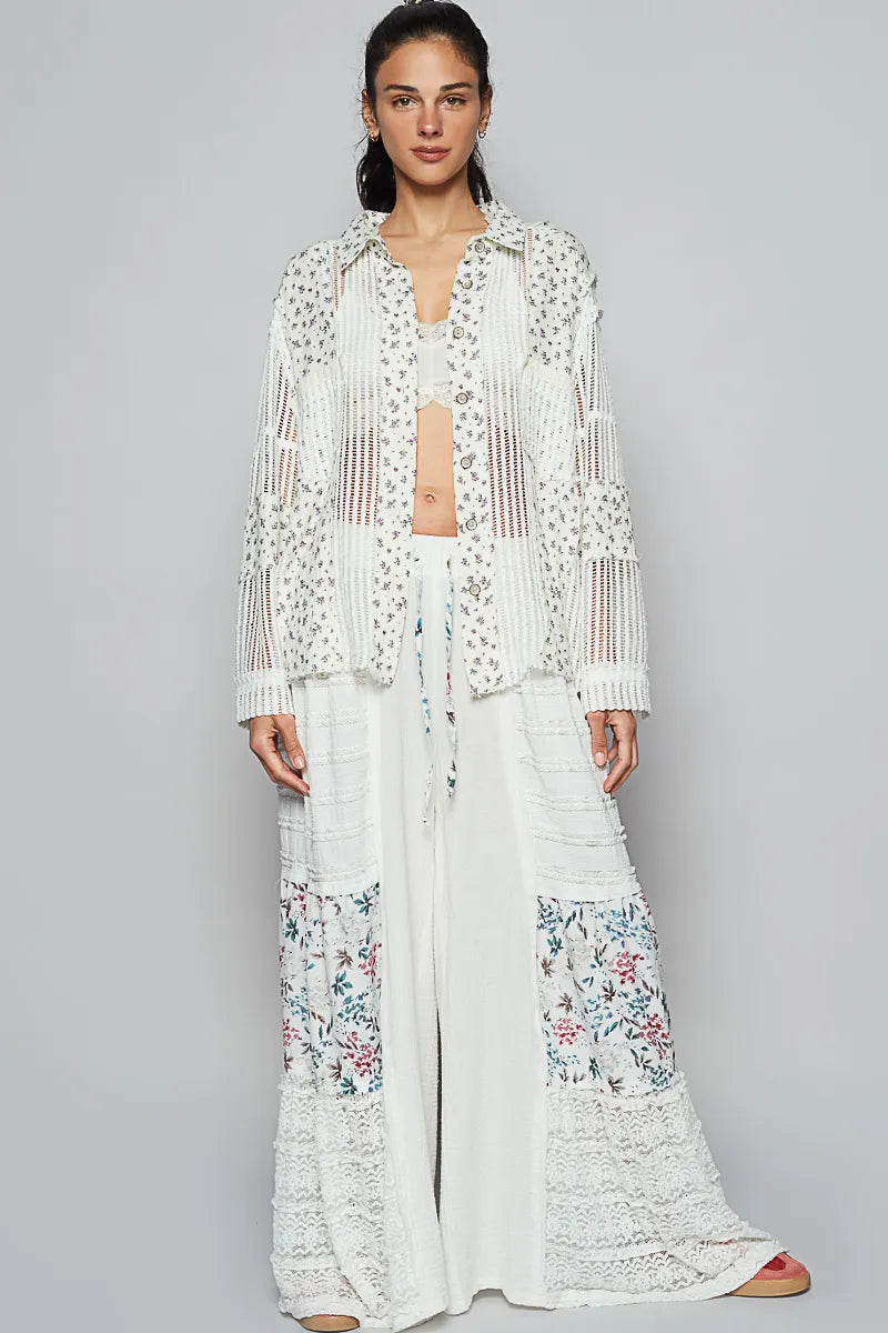 White floral crochet patchwork long sleeve shirt from Trendsi with intricate crochet details and a relaxed fit.