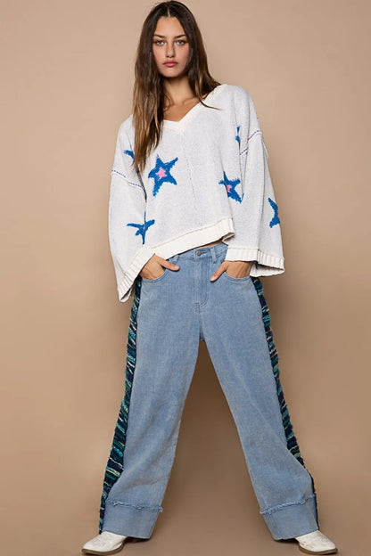 White POL long sleeve star patch sweater by Trendsi featuring a cozy knit with star patches on the front and ribbed cuffs.