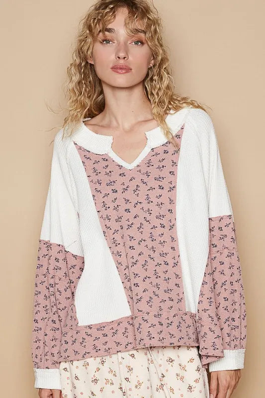 White waffle knit floral long sleeve top with notched neckline by Trendsi, featuring a cozy, stylish design.