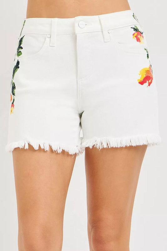 White RISEN high-rise flower printed shorts with tummy control from Trendsi, showcasing a stylish, comfortable summer design.