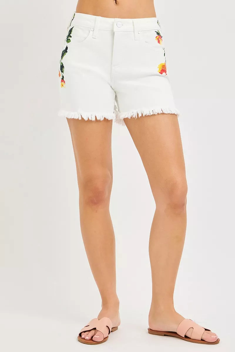 White RISEN high-rise shorts with tummy control and flower print from Trendsi, shown on a model.