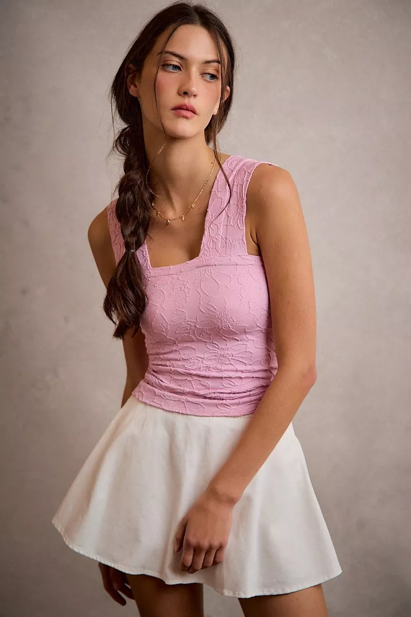 White SO ME denim bubble skort with smocked back, showcasing its casual style and comfortable fit, perfect for everyday wear.