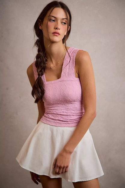 White SO ME denim bubble skort with smocked back, showcasing its casual style and comfortable fit, perfect for everyday wear.