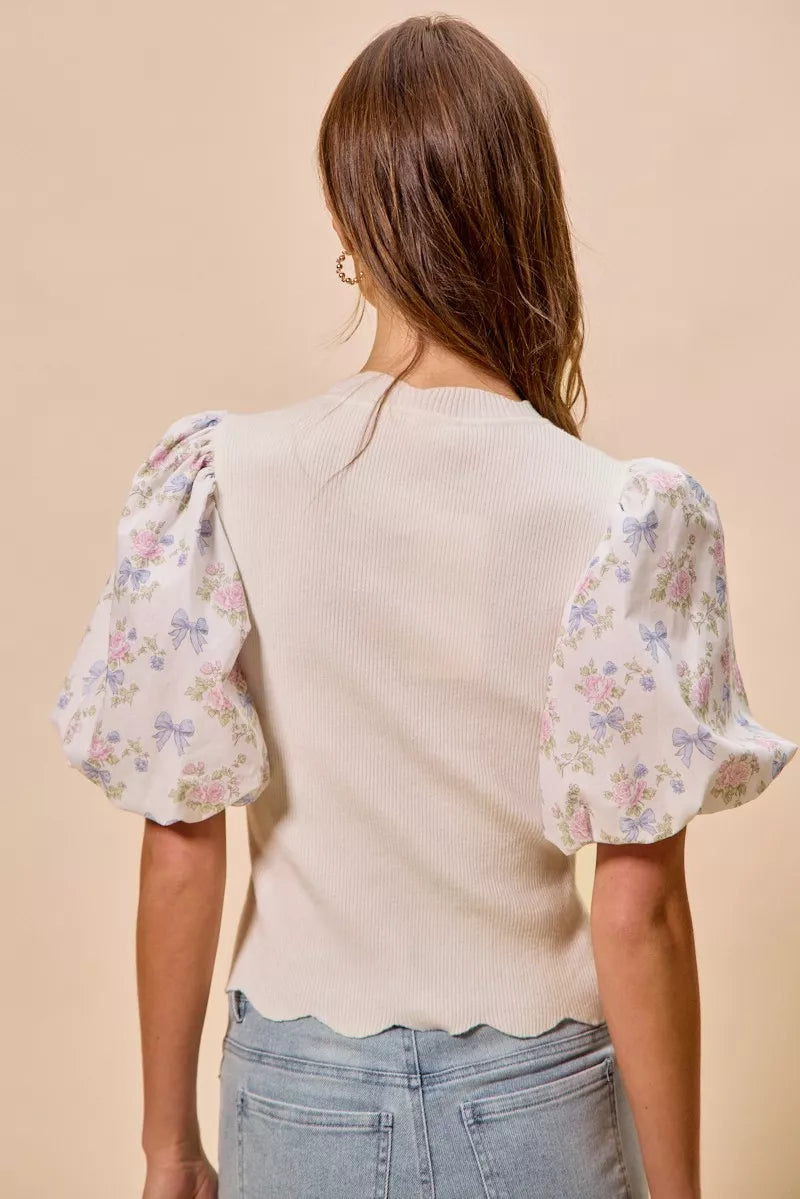 White floral cotton sweater top with contrasting sleeves and scalloped hem, designed by Trendsi.