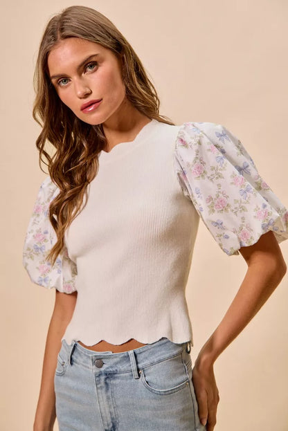 White floral cotton sweater top with contrast sleeves and scallop hem, by Trendsi, styled with a casual, trendy look.
