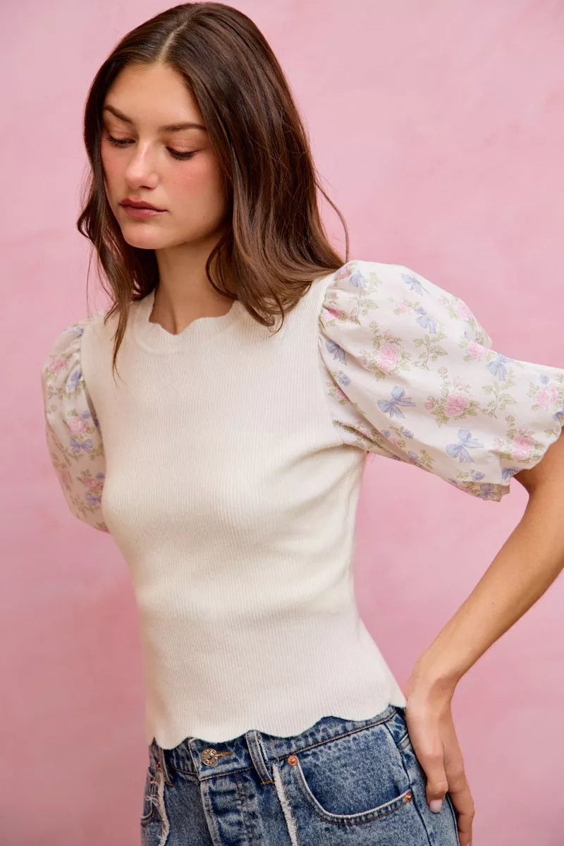 White floral cotton sweater top with contrast sleeves and scallop hem, stylish and comfortable from Trendsi.