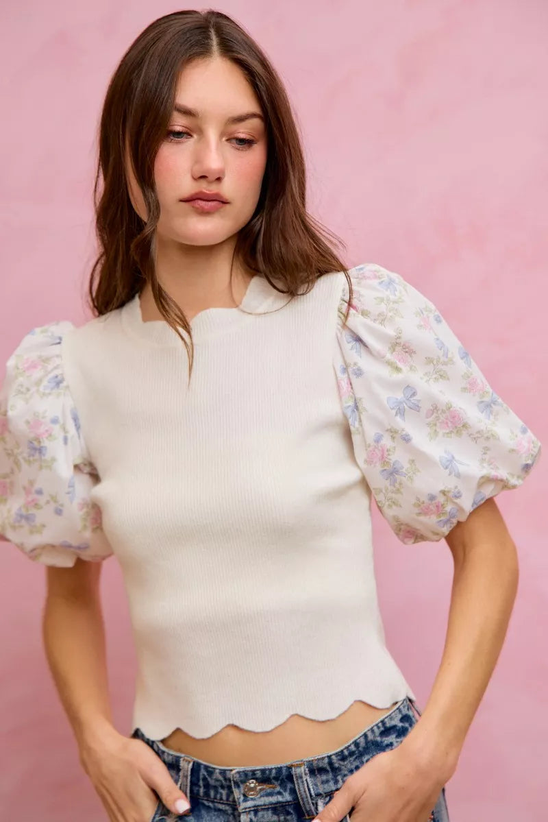 White floral cotton sweater top with contrast sleeves and scalloped hem, stylish and comfortable from Trendsi.
