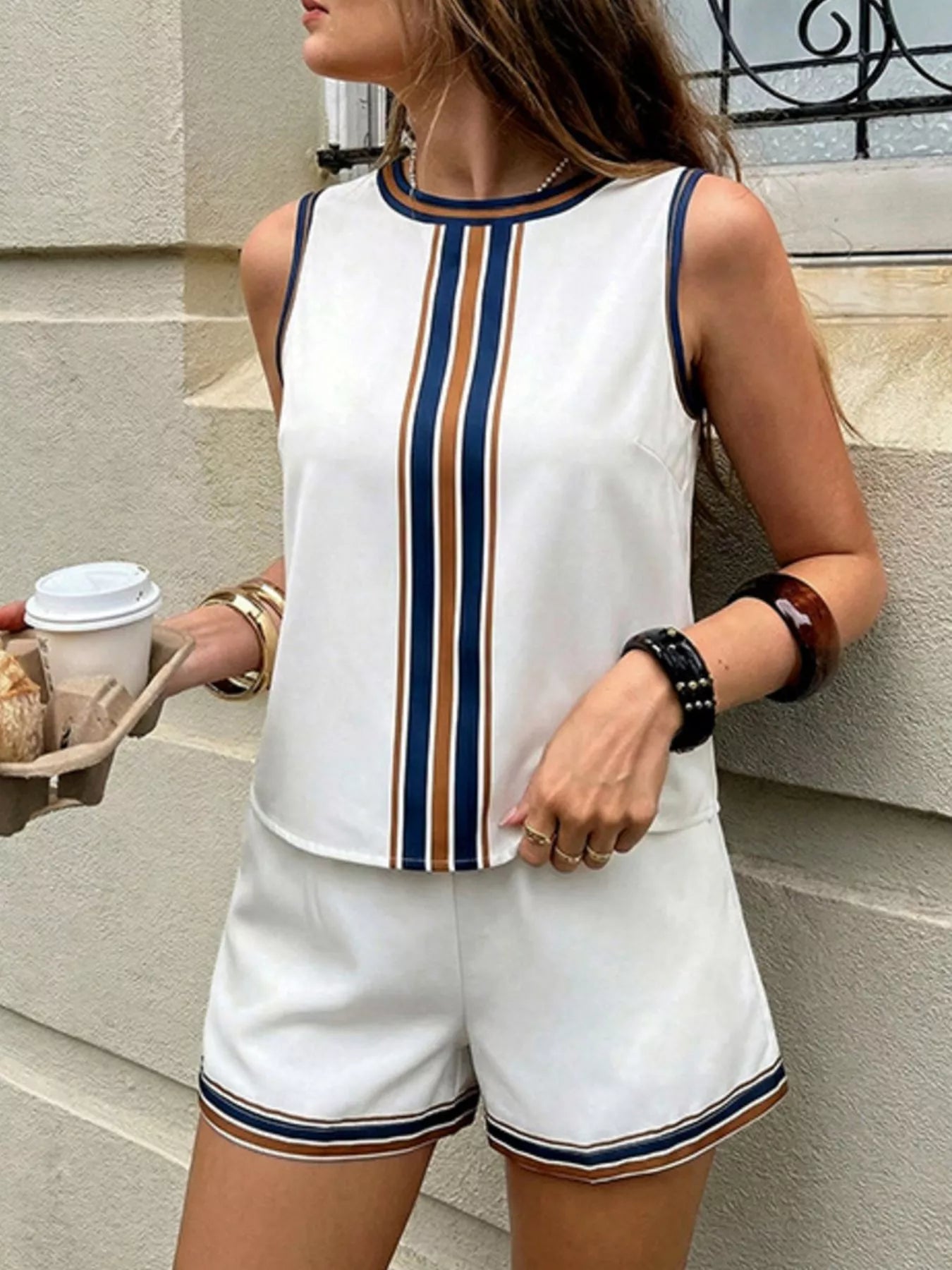 White striped sleeveless top and shorts set by Trendsi, casual summer outfit with lightweight fabric and relaxed fit.