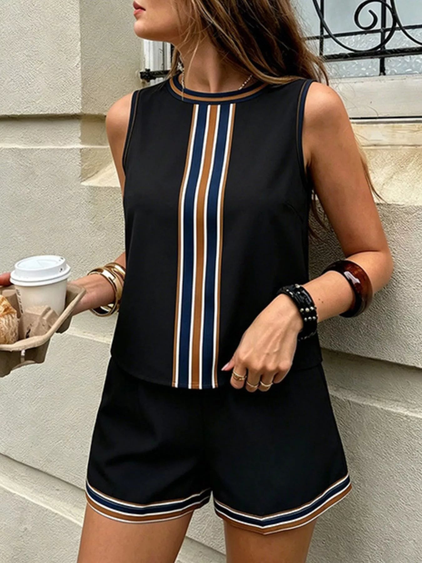 White striped sleeveless top and shorts set by Trendsi, casual summer outfit with comfortable fit and stylish design.
