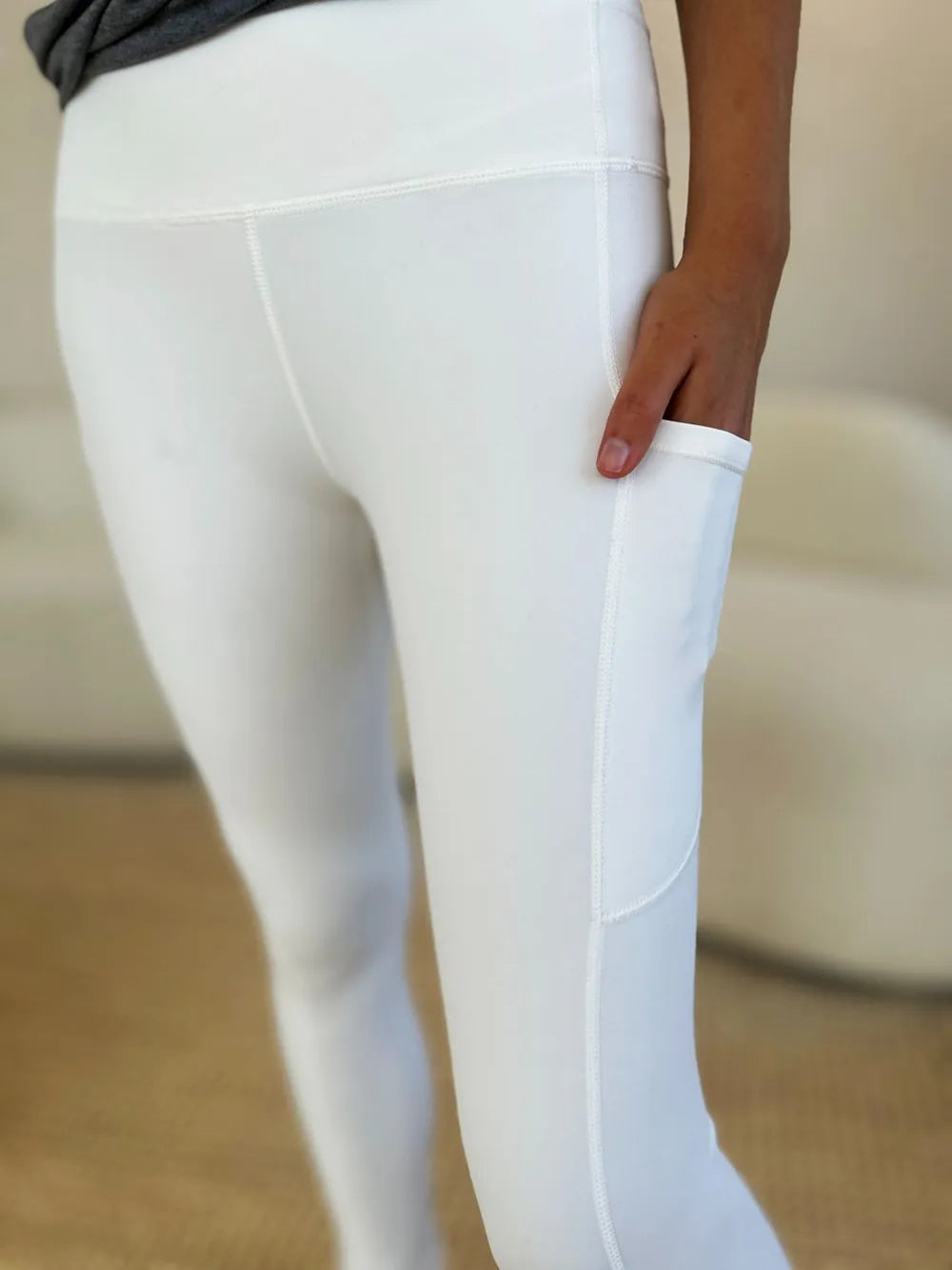 White wide waistband sports leggings by Trendsi, showcasing a comfortable fit and stretchy fabric for active wear.