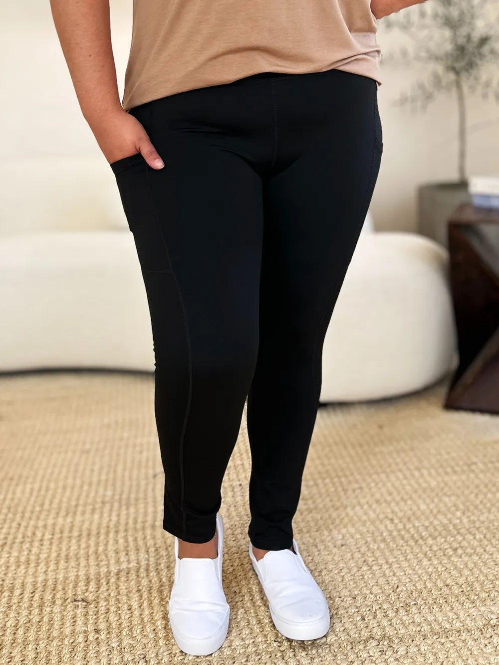 White wide waistband sports leggings by Trendsi, stretchy athletic leggings with comfortable fit and sleek design.