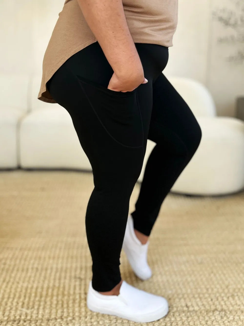 White wide waistband sports leggings from Trendsi with a comfortable fit and sleek design, ideal for active wear and workouts.